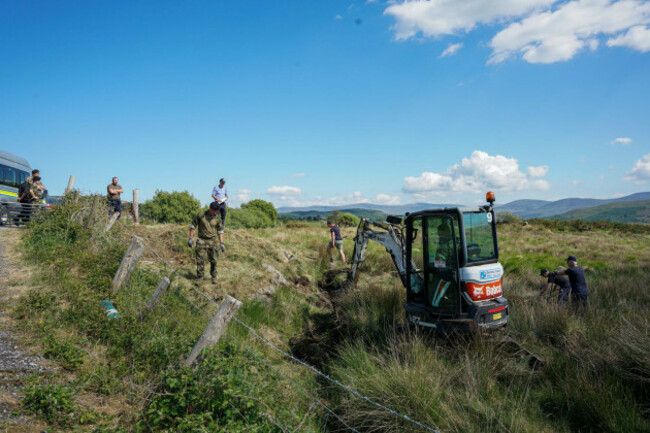 army-personnel-using-a-small-digger-as-close-to-the-farm-of-michael-mike-gaine-near-kenmare-in-co-kerry-as-the-search-for-the-56-year-old-sheep-farmer-continues-on-saturday-partial-remains-were-f