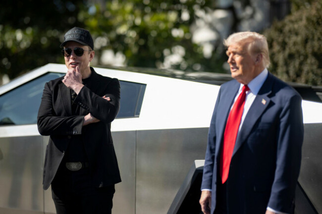 washington-united-states-11th-mar-2025-u-s-president-donald-trump-right-stands-with-billionaire-elon-musk-by-a-tesla-cybertruck-on-the-south-lawn-of-the-white-house-march-11-2025-in-washington