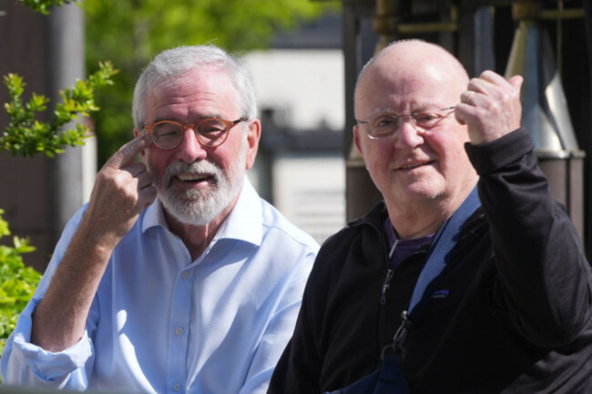 former-sinn-fein-president-gerry-adams-in-conversation-with-singer-songwriter-christy-moore-outside-the-high-court-in-dublin-where-he-is-bringing-a-legal-action-against-the-bbc-over-allegations-about