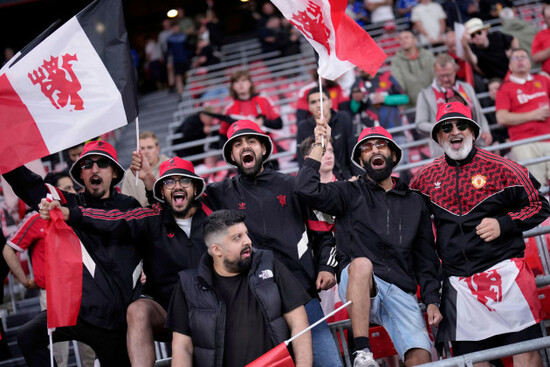 manchester-united-fans-cheer-before-the-europa-league-final-soccer-match-between-tottenham-hotspur-and-manchester-united-at-the-san-mames-stadium-in-bilbao-spain-wednesday-may-21-2025-ap-photob