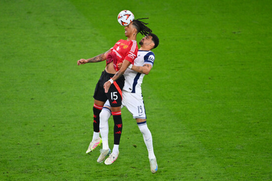 manchester-uniteds-leny-yoro-left-and-tottenhams-dominic-solanke-jump-for-the-ball-during-the-europa-league-final-soccer-match-between-tottenham-hotspur-and-manchester-united-at-the-san-mames-stad