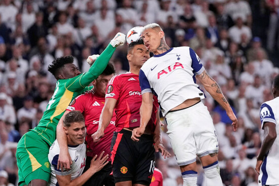 tottenhams-richarlison-right-challenges-for-the-ball-with-manchester-uniteds-casemiro-center-and-manchester-uniteds-goalkeeper-andre-onana-left-during-the-europa-league-final-soccer-match-bet