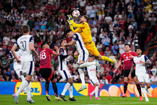 tottenhams-goalkeeper-guglielmo-vicario-jumps-for-the-ball-during-the-europa-league-final-soccer-match-between-tottenham-hotspur-and-manchester-united-at-the-san-mames-stadium-in-bilbao-spain-wedne