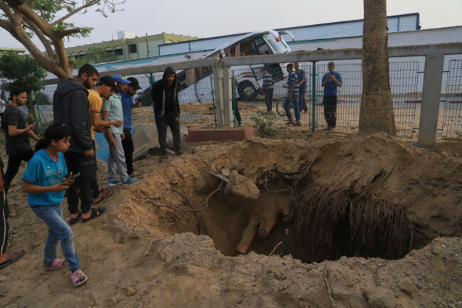 palestinians-inspect-the-site-of-an-israeli-army-airstrike-on-the-european-hospital-in-khan-younis-gaza-strip-tuesday-may-13-2025-the-israeli-military-said-it-had-carried-out-a-strike-targeting-w
