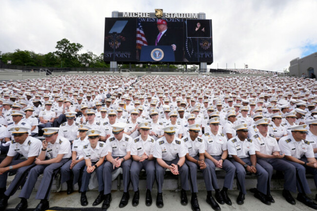 cadets-listen-as-president-donald-trump-seen-on-screen-speaks-to-united-states-military-academy-graduating-cadets-during-commencement-ceremonies-in-west-point-n-y-saturday-may-24-2025-ap-phot