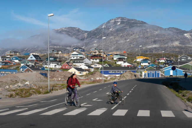 mother-and-child-cycling-in-nuuk-the-capital-of-greenland