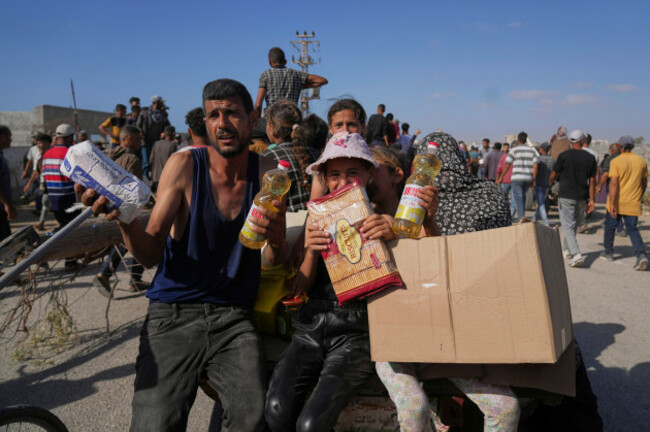 palestinians-show-to-the-camera-food-and-humanitarian-aid-packages-they-received-from-the-gaza-humanitarian-foundation-a-u-s-backed-group-approved-by-israel-in-rafah-southern-gaza-strip-on-tuesday