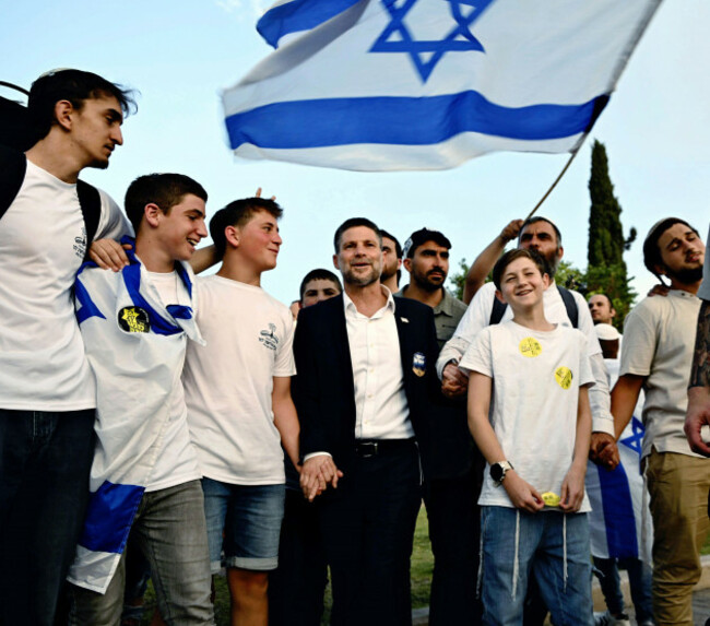far-right-supporters-including-bezalel-yoel-smotrich-minister-of-finance-and-leader-of-the-national-religious-partyreligious-zionism-march-through-old-city-in-jerusalem-israel-on-may-26-2025-tho