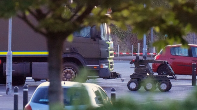 the-army-explosive-ordnance-disposal-eod-team-near-to-the-scene-at-fairgreen-shopping-centre-carlow-where-a-man-is-understood-to-have-died-following-a-shooting-incident-the-pa-news-agency-underst