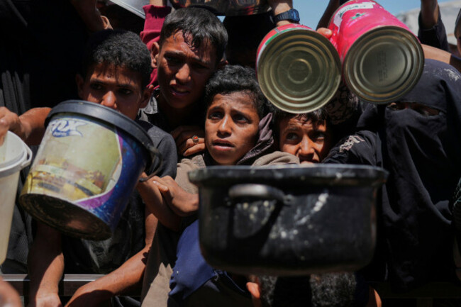 palestinians-struggle-to-get-donated-food-at-a-community-kitchen-in-khan-younis-southern-gaza-strip-monday-june-2-2025-ap-photoabdel-kareem-hana