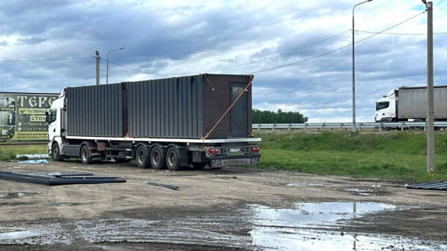 this-photo-released-by-governor-of-irkutsk-region-igor-kobzev-telegram-channel-on-sunday-june-1-2025-shows-a-truck-used-to-release-some-of-the-ukrainian-drones-that-attacked-russian-air-bases-in-th