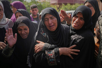 palestinians-mourn-during-the-funeral-of-reem-al-akhras-who-was-killed-while-heading-to-a-gaza-aid-hub-in-khan-younis-southern-gaza-strip-tuesday-june-3-2025-ap-photoabdel-kareem-hana