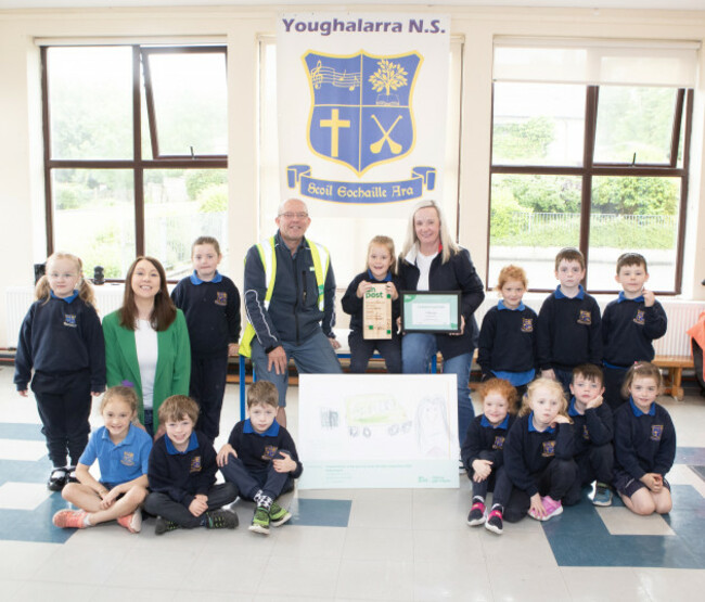 An Post writing winner Holly Hogan 6, a junior infant student at Youghalarra National School, Newtown, Nenagh, Co. Tipperary photographed with her mother, her teacher Lourda Conway and Martin McKenna.