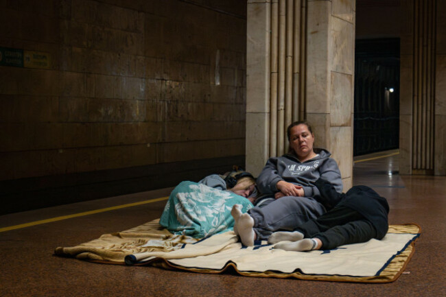 people-rest-in-a-metro-station-being-used-as-a-bomb-shelter-during-a-russian-drones-attack-in-kyiv-ukraine-early-friday-june-6-2025-ap-photodan-bashakov