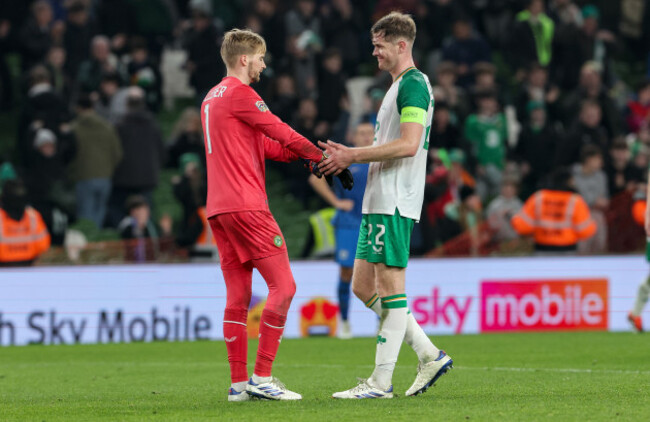 caoimhin-kelleher-and-nathan-collins-celebrate-after-the-game