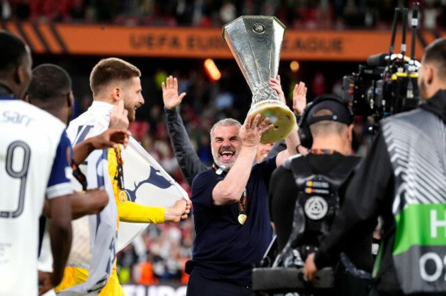 tottenham-hotspur-manager-ange-postecoglou-centre-celebrates-with-the-trophy-following-victory-in-the-uefa-europa-league-final-at-the-estadio-de-san-mames-in-bilbao-spain-picture-date-wednesday-m
