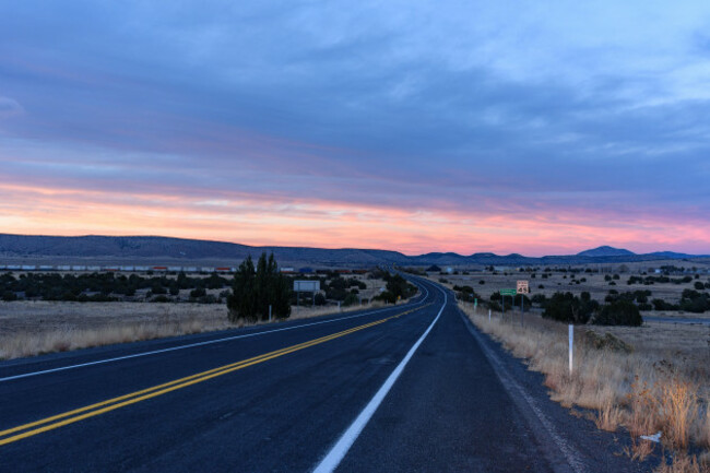 the-road-leading-to-seligman-arizona-at-twilight