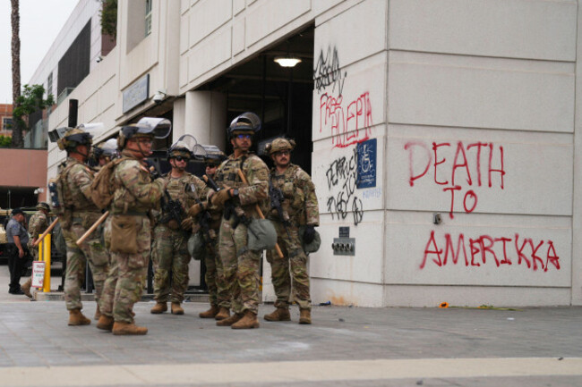 u-s-national-guard-are-deployed-around-downtown-los-angeles-sunday-june-8-2025-following-a-immigration-raid-protest-the-night-before-ap-photoeric-thayer
