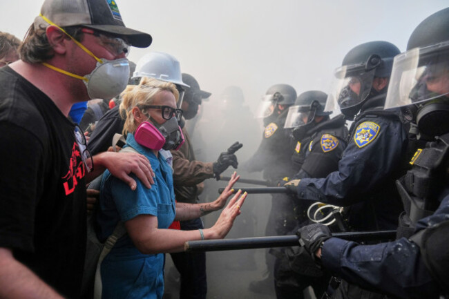 protesters-confront-police-on-the-101-freeway-near-the-metropolitan-detention-center-of-downtown-los-angeles-sunday-june-8-2025-following-last-nights-immigration-raid-protest-ap-photojae-c-ho