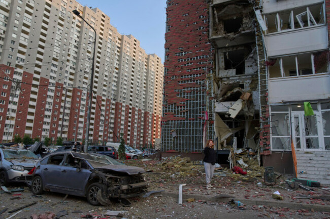 a-resident-reacts-near-their-damaged-multi-storey-building-damaged-in-russias-massive-missile-and-drone-attack-in-kyiv-ukraine-tuesday-june-10-2025-ap-photoefrem-lukatsky