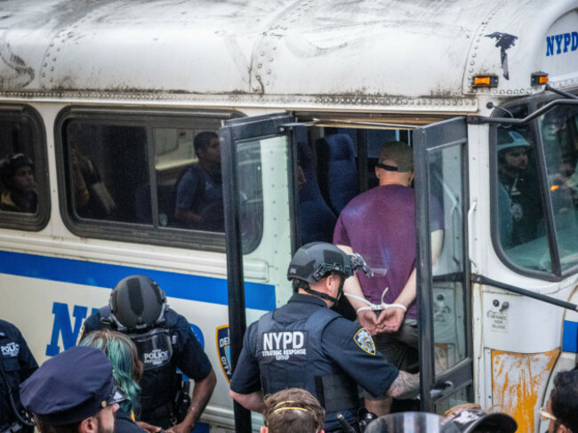 new-york-new-york-usa-10th-june-2025-a-demonstrator-is-being-loaded-into-the-bus-hundreds-of-protesters-gathered-outside-26-federal-plaza-in-new-york-city-to-denounce-ice-arrests-reportedly-targ