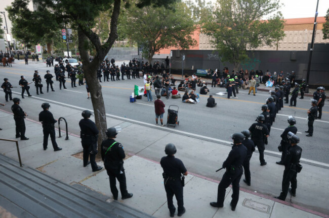 police-kettle-protesters-under-arrest-on-wednesday-june-11-2025-in-los-angeles-ap-photoethan-swope