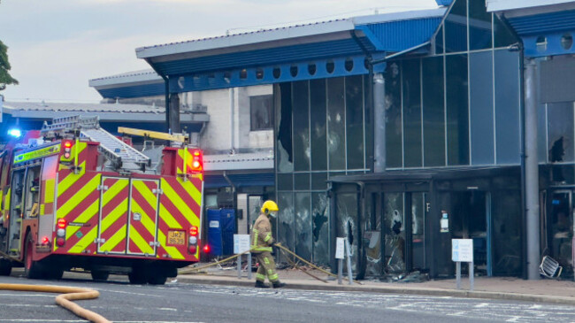 fire-fighters-at-the-scene-where-a-fire-has-broken-out-at-larne-leisure-centre-following-vandalism-at-the-facility-it-comes-after-two-nights-of-violence-and-public-disorder-in-the-town-of-ballymena
