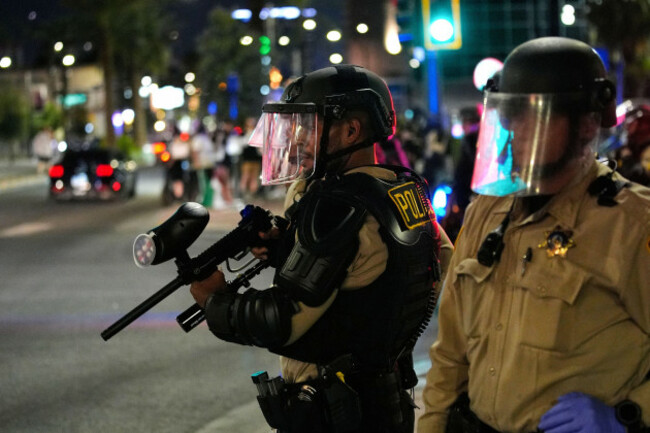 las-vegas-police-push-back-protesters-during-protests-over-president-donald-trumps-stepped-up-enforcement-of-immigration-laws-wednesday-june-11-2025-in-las-vegas-ap-photojohn-locher