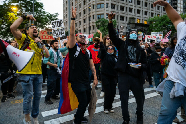seattle-usa-11th-jun-2025-just-after-700pm-protestors-at-the-from-la-to-seattle-ice-out-protest-on-capitol-hill-in-cal-anderson-park-the-group-marched-to-the-henry-m-jackson-federal-building