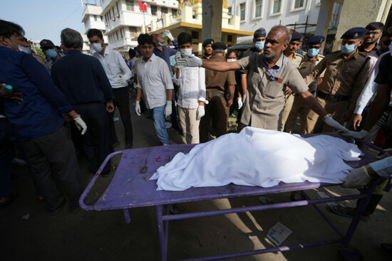 the-remains-of-a-victim-is-brought-to-civil-hospital-after-an-airplane-crashed-in-indias-northwestern-city-of-ahmedabad-in-gujarat-state-thursday-june-12-2025-ap-photoajit-solanki