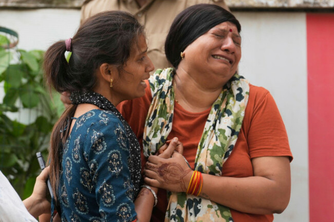 grieving-relatives-of-air-india-plane-crash-victims-mourn-outside-the-autopsy-room-at-a-hospital-in-ahmedabad-india-friday-june-13-2025-ap-photorafiq-maqbool