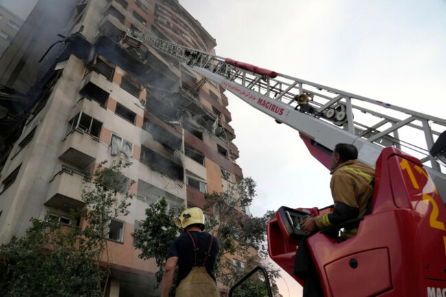 firefighters-work-the-scene-of-an-explosion-at-a-residence-compound-in-northern-tehran-iran-friday-june-13-2025-ap-photovahid-salemi