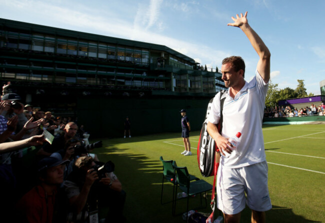 conor-niland-waves-to-the-crowd-as-he-walks-off
