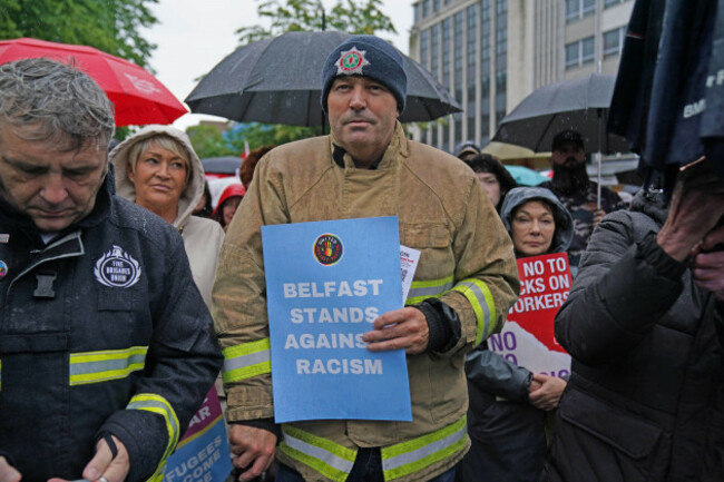 demonstrators-take-part-in-a-united-against-racism-rally-at-belfast-city-hall-petrol-bombs-were-thrown-at-police-for-a-fifth-consecutive-night-in-northern-ireland-in-what-has-been-dubbed-a-week-of