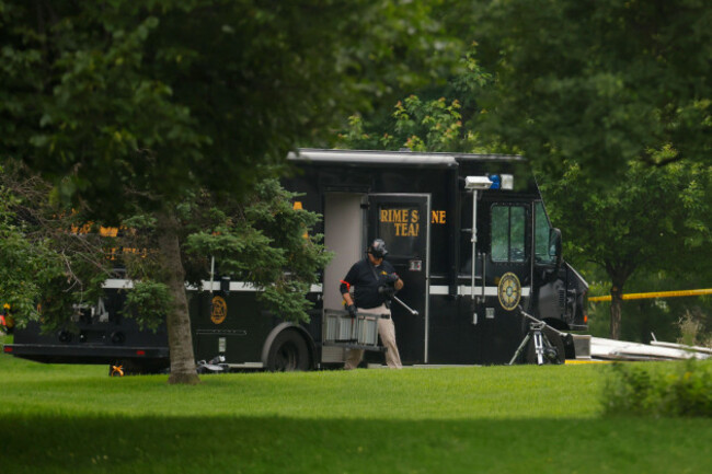 investigators-work-outside-the-home-of-democratic-former-house-speaker-melissa-hortman-and-her-husband-mark-who-were-shot-and-killed-earlier-in-the-day-saturday-june-14-2025-in-brooklyn-park-mi