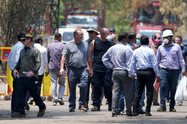investigators-come-out-after-visiting-thursdays-air-india-plane-crash-site-in-ahmedabad-india-sunday-june-15-2025-ap-photoajit-solanki