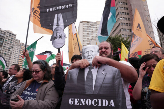 palestinian-supporters-hold-cardboard-cutouts-of-u-s-president-donald-trump-and-israeli-prime-minister-benjamin-netanyahu-during-a-march-against-israels-war-in-gaza-in-sao-paulo-sunday-june-15-20