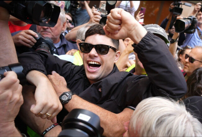 kneecaps-naoise-o-caireallain-moglai-bap-arrives-at-westminster-magistrates-court-in-london-where-his-bandmate-liam-og-o-hannaidh-is-appearing-charged-with-a-terrorism-offence-the-27-year-old-fr