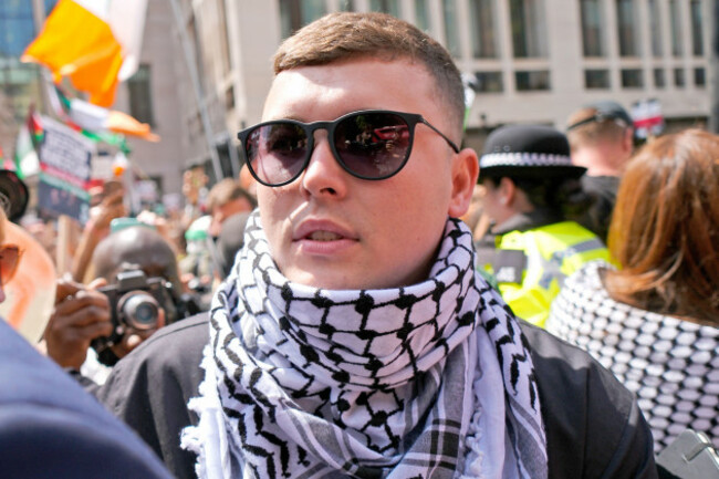 kneecaps-liam-og-o-hannaidh-leaves-westminster-magistrates-court-in-london-through-a-crowd-of-supporters-after-he-appeared-charged-with-a-terrorism-offence-the-27-year-old-from-belfast-who-perfor