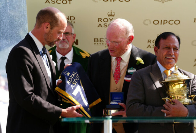 the-prince-of-wales-presents-a-commemorative-saddle-blanket-to-trainer-john-gosden-following-his-70th-win-after-ombudsman-won-the-prince-of-waless-stakes-with-ombudsman-on-day-two-of-royal-ascot-at-a