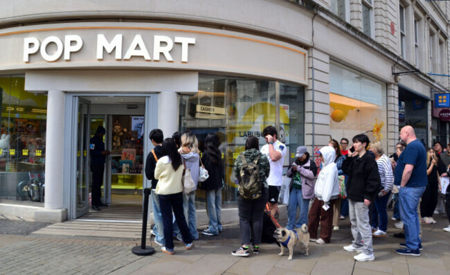 manchester-uk-25th-april-2025-a-large-queue-formed-at-the-pop-mart-shop-in-piccadilly-central-manchester-uk-as-pop-mart-launches-version-three-of-the-art-toy-big-into-energy-labubu-series-at