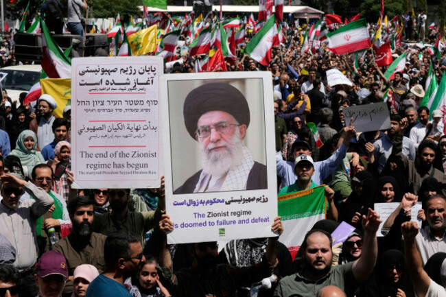 iranian-protestors-carry-portrait-of-the-supreme-leader-ayatollah-ali-khamenei-and-anti-israeli-signs-during-a-protest-to-condemn-israeli-attacks-on-multiple-cities-across-iran-after-the-friday-praye