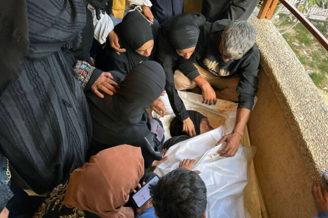 palestinians-mourn-by-the-bodies-of-relatives-who-were-killed-by-israeli-fire-as-they-gathered-near-a-us-backed-aid-center-at-the-nasser-hospital-palestinians-mourn-by-the-bodies-of-relatives-who-wer