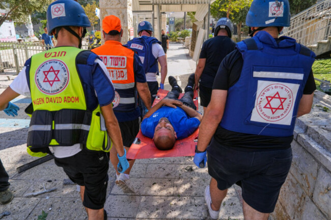 a-man-is-evacuated-by-an-israeli-emergency-team-after-a-missile-from-iran-hits-in-haifa-israel-friday-june-20-2025-ap-photobaz-ratner