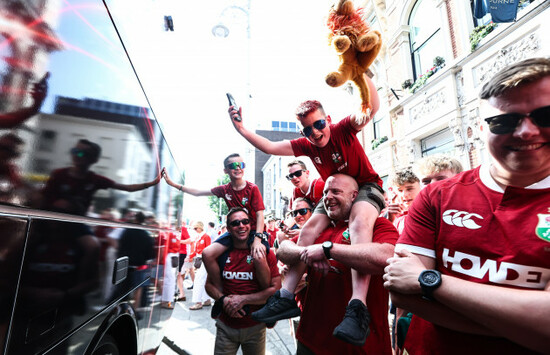 british-irish-lions-fans-cheer-the-team-as-they-get-onto-the-team-bus