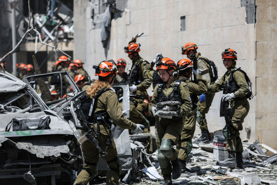 june-24-2025-beer-sheva-beer-sheva-israel-israeli-rescue-teams-operate-at-the-scene-of-a-missile-strike-on-a-residential-area-in-beer-sheva-southern-israel-24-june-2025-according-to-the-isr