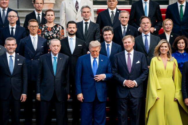 us-president-donald-trump-center-along-with-the-king-willem-alexander-second-right-and-queen-maxima-of-the-netherlands-right-poses-for-a-family-photo-at-the-2025-nato-summit-in-the-hague-on-tue