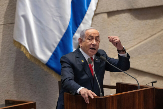 israels-prime-minister-benjamin-netanyahu-addresses-lawmakers-in-the-knesset-israels-parliament-in-jerusalem-monday-nov-18-2024-ap-photoohad-zwigenberg