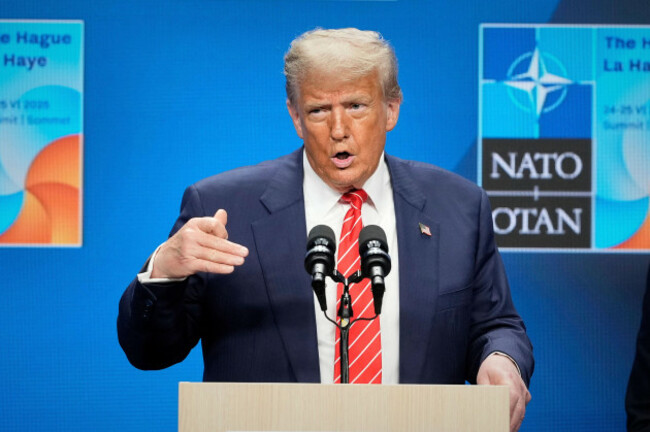 president-donald-trump-gestures-standing-between-secretary-of-state-marco-rubio-right-and-defense-secretary-pete-hegseth-during-a-press-conference-after-the-plenary-session-at-the-nato-summit-in-the