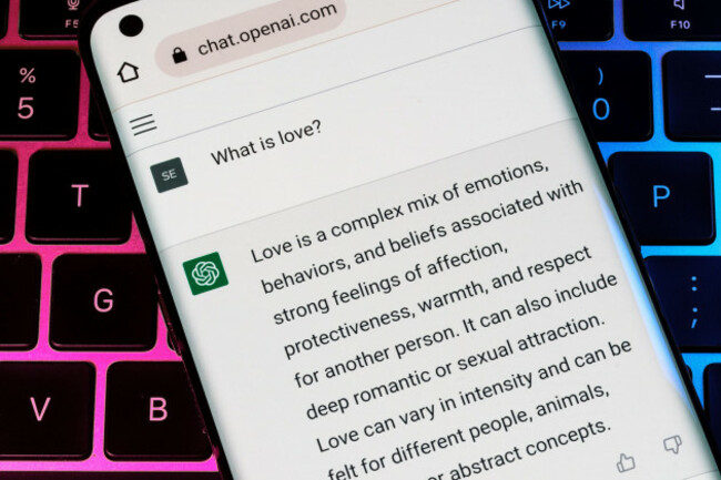 open-ai-chatgpt-chat-bot-seen-on-smartphone-placed-on-laptop-ai-chatbot-responded-to-the-question-about-love-stafford-united-kingdom-december-13